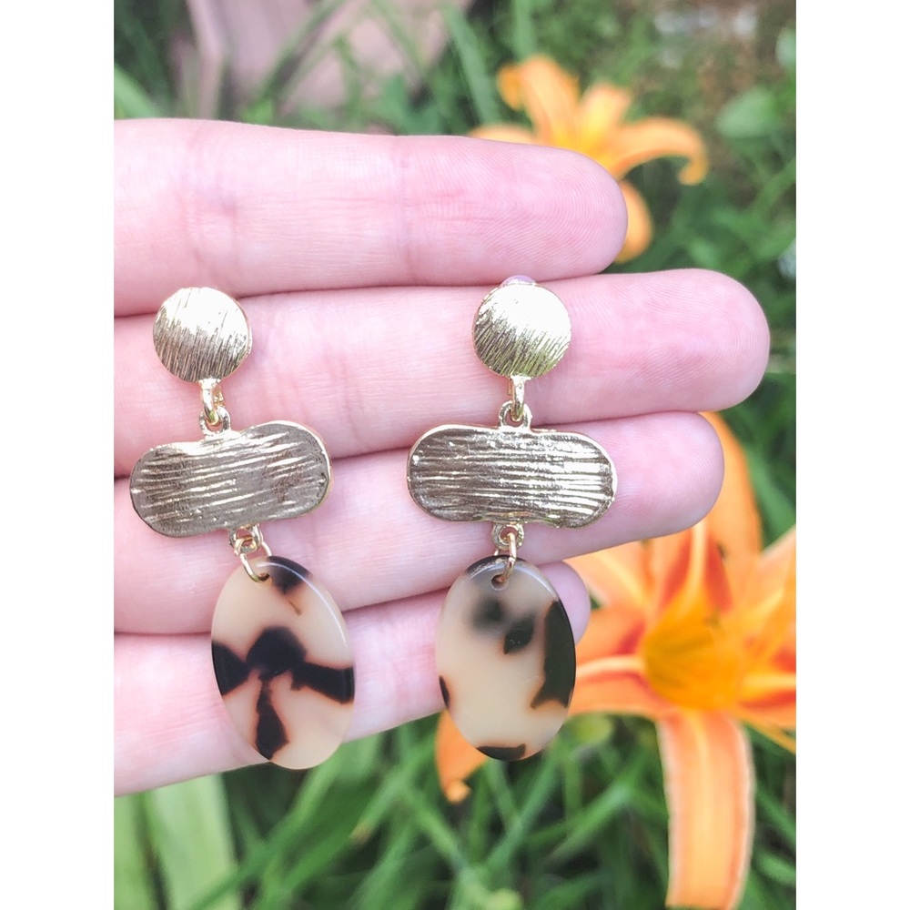 Gold cream and black resin earrings